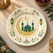 Ivory charger plate with gold trim featuring a crescent around a domed mosque and lanterns