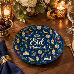 Navy charger plate with gold trim featuring Eid script, lanterns and star medallions