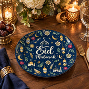 Navy charger plate with gold trim featuring Eid script, lanterns and star medallions