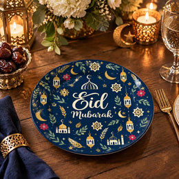 Navy charger plate with gold trim featuring Eid script, lanterns and star medallions