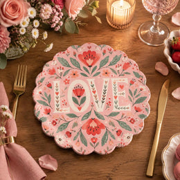 Pink scalloped plate with cream LOVE letters between coral tulips