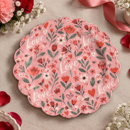 Pink scalloped plate with repeating Love script, tulips and daisies