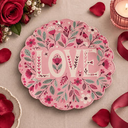 Pink scalloped plate with floral cream LOVE letters among pink blooms
