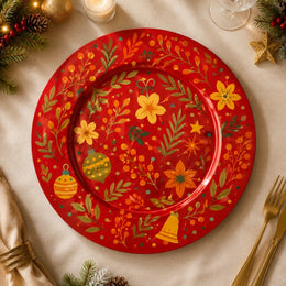 * Flat lay view of a decorative red Christmas charger plate with a festive holiday design.