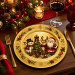 * Gold Christmas charger plate styled on a festive holiday dinner table setting with candles and pine cones.