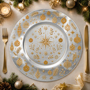 * Elegant silver Christmas charger plate with festive winter patterns on a clean background.