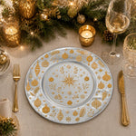 * Silver Christmas charger plates styled on a beautifully set holiday dinner table with candles and pine cones.