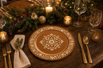 A rustic copper and cream floral charger plate set on a cozy wedding banquet table with elegant tableware._