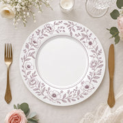 * Elegant white wedding charger plate featuring a delicate floral pattern around the rim, top-down view.