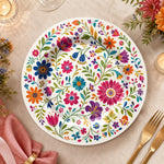 * Elegant white charger plate featuring a delicate pastel wedding floral and botanical pattern border.