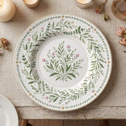 * Minimalist white charger plate with a delicate gold rim, showing the flat, elegant top-down design.