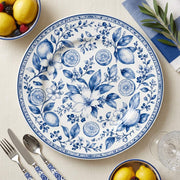 * Top-down view of a classic white beaded charger plate showing its elegant textured rim and clean round design.