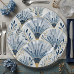 * Clear glass charger plate with a beaded rim design shown from a flat, top-down view.