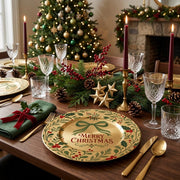* A beautifully set wedding reception table featuring gold charger plates, white dinnerware, and elegant glassware.