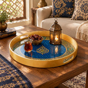 Ramadan Plastic Serving Tray – Gold on Green Script plastic serving tray shown in a round styled scene.