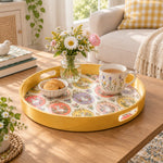 Easter Decorative Serving Tray – Gold Folk Bloom Medley plastic serving tray shown in a round styled scene.
