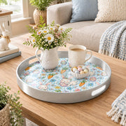 Easter Decorative Serving Tray – Green Folk Leaf Border plastic serving tray shown in a round styled scene.