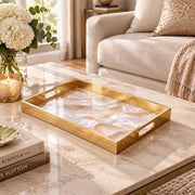 Daily Decorative Glass Serving Tray – Opaline Agate Wave glass serving tray shown in a first styled room scene.