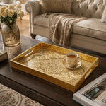 Grand Mandala Glass Serving Tray – Golden Leaf Scrollwork glass serving tray shown in a first styled room scene.