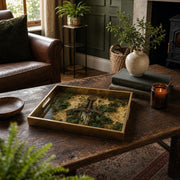Ivy Vine Heritage Sword Glass Serving Tray – Gold Celtic Border glass serving tray shown in a first styled room scene.