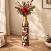 Christmas Ornament Metal Flower Vase – Poinsettia Bell Pattern decorative metal vase shown in a styled room scene.