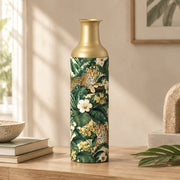 Jungle Leopard Metal Flower Vase – Monstera White Hibiscus decorative metal vase shown in a styled room scene.