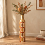 Terra Frames Metal Flower Vase – Burnt Orange Retro Frame decorative metal vase shown in a styled room scene.