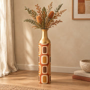 Terra Frames Metal Flower Vase – Burnt Orange Retro Frame decorative metal vase shown in a styled room scene.