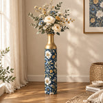 Amber Scroll Metal Flower Vase – Navy Gold Dusty Blue Bloom decorative metal vase shown in a styled room scene.