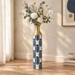 Sage Stripe Metal Flower Vase – Navy Amphora Grid Stripe decorative metal vase shown in a styled room scene.