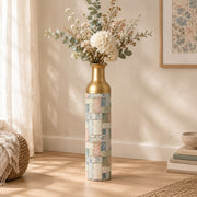 Indigo Weave Metal Flower Vase – Faded Blossom Patchwork decorative metal vase shown in a styled room scene.