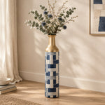 Indigo Weave Metal Flower Vase – Indigo Stripe Patchwork decorative metal vase shown in a styled room scene.