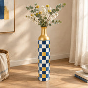 Emerald Check Metal Flower Vase – Amber Accent Checker decorative metal vase shown in a styled room scene.