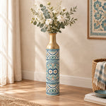 Lagoon Tile Metal Flower Vase – Ivory Rosette Tile decorative metal vase shown in a styled room scene.