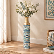 Lagoon Tile Metal Flower Vase – Ivory Rosette Tile decorative metal vase shown in a styled room scene.