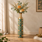 Gilded Jaali Metal Flower Vase – Oxide Teal Vine Scroll decorative metal vase shown in a styled room scene.