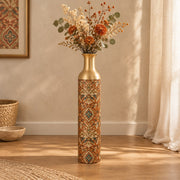 Verdigris Damask Metal Flower Vase – Oxide Rust Ogee Medallion decorative metal vase shown in a styled room scene.
