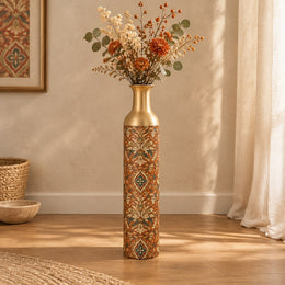 Verdigris Damask Metal Flower Vase – Oxide Rust Ogee Medallion decorative metal vase shown in a styled room scene.