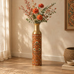 Saffron Meena Metal Flower Vase – Brick Rust Pigment Bloom decorative metal vase shown in a styled room scene.