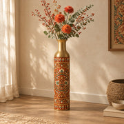 Saffron Meena Metal Flower Vase – Brick Rust Pigment Bloom decorative metal vase shown in a styled room scene.