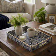 Navy Paisley Swirl Plastic Serving Tray – Full Print Border full-print plastic serving tray shown in a styled room scene.