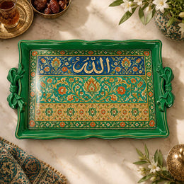 Emerald green tray with gold trim featuring calligraphy above a floral band on a green ground