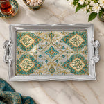 Warm ivory tray with gold trim featuring a cream medallion of blossoms inside a fine gold keyline