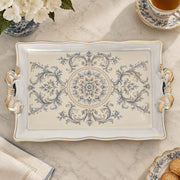 Ivory white tray with gold trim featuring a blue rosette medallion and acanthus scrolls
