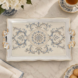 Ivory white tray with gold trim featuring a blue rosette medallion and acanthus scrolls