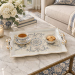 Ivory white tray with gold trim featuring a blue rosette medallion and acanthus scrolls