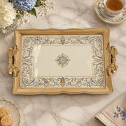 Warm cream tray with gold trim featuring a blue and gold baroque scroll border