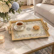 Warm cream tray with gold trim featuring a blue and gold baroque scroll border