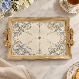 Cream tray with gold trim featuring blue scroll sprays in the corners