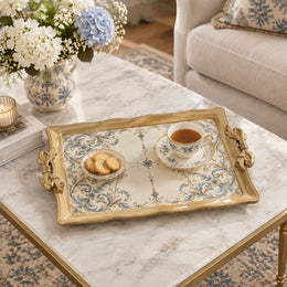 Cream tray with gold trim featuring blue scroll sprays in the corners